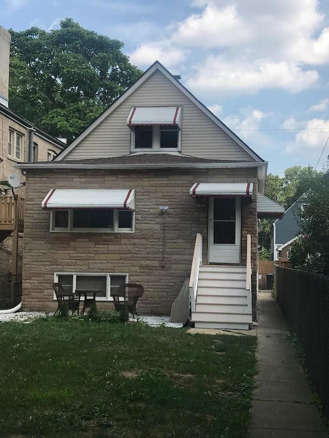 3255 N Kenneth Ave, Chicago, IL 60641 - back of property with entry steps and stone siding