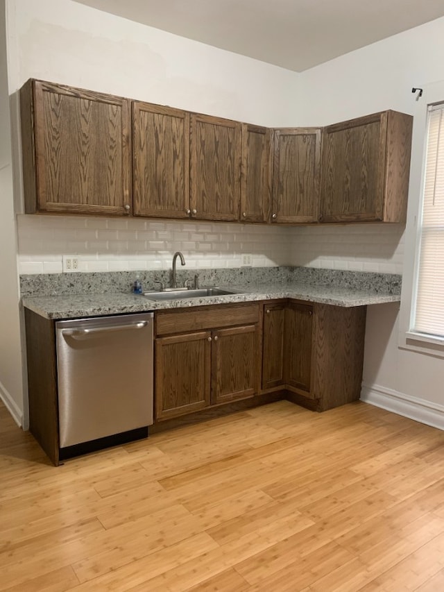 3255 N Kenneth Ave, Chicago, IL 60641 - kitchen featuring dishwasher, light wood-style floors, tasteful backsplash, and dark brown cabinetry