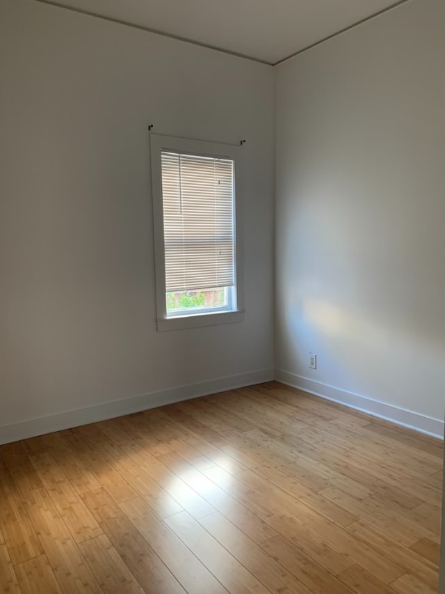 3255 N Kenneth Ave, Chicago, IL 60641 - unfurnished room featuring light wood-type flooring and baseboards