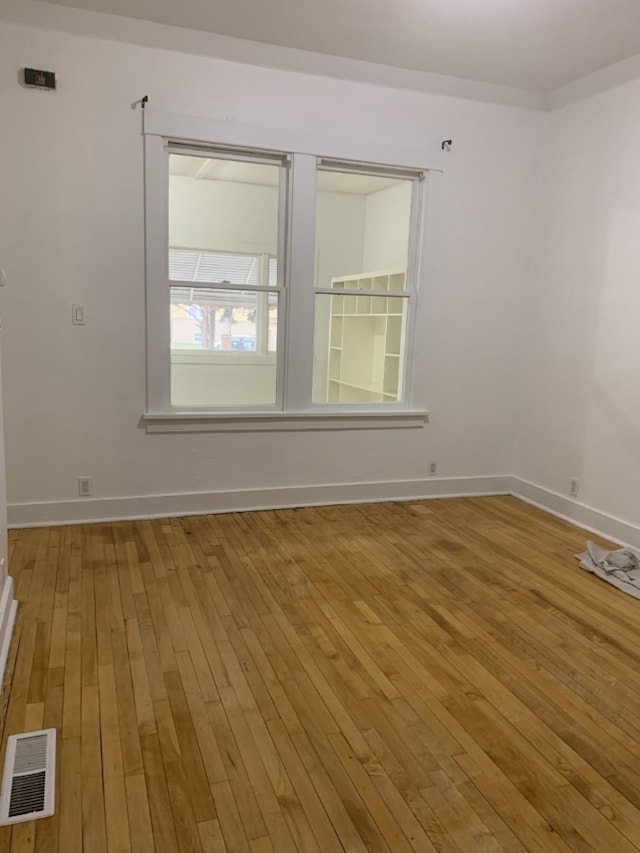 3255 N Kenneth Ave, Chicago, IL 60641 - unfurnished room featuring hardwood / wood-style flooring and baseboards