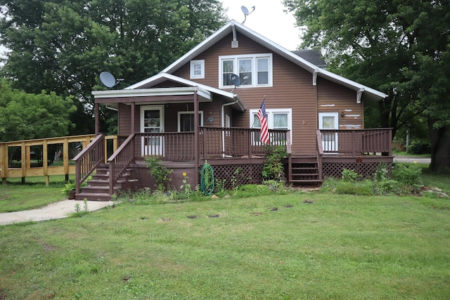 105 Bradley St, New Bedford, IL 61346 - view of front of home featuring a front yard and a porch