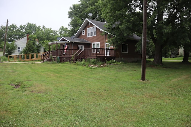 105 Bradley St, New Bedford, IL 61346 - view of green lawn featuring a wooden deck