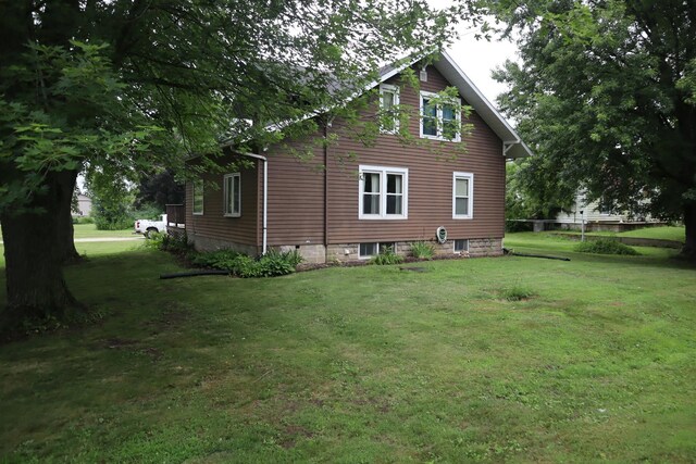 105 Bradley St, New Bedford, IL 61346 - view of side of property with a lawn