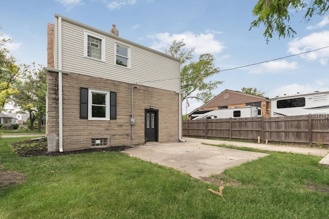 1225 Highridge Pkwy, Westchester, IL 60154 - back of house with a patio area, stone siding, and a chimney