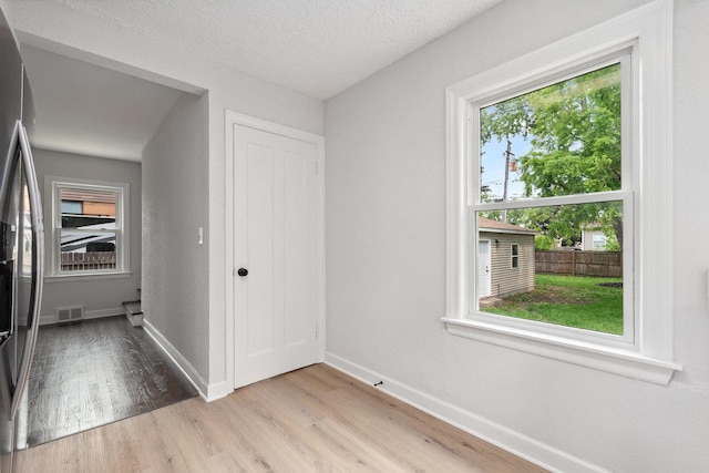 1225 Highridge Pkwy, Westchester, IL 60154 - unfurnished room featuring light wood finished floors and baseboards