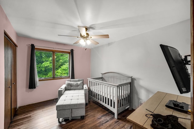 13460 185th St, Mokena, IL 60448 - bedroom with dark wood-style flooring, a ceiling fan, a closet, and a nursery area