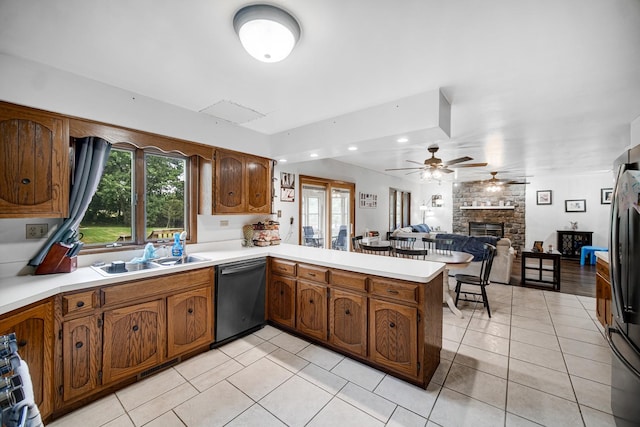 13460 185th St, Mokena, IL 60448 - kitchen featuring dishwasher, a peninsula, a ceiling fan, light countertops, and light tile patterned flooring