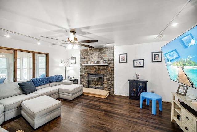13460 185th St, Mokena, IL 60448 - living area featuring track lighting, dark wood-style flooring, a fireplace, and ceiling fan