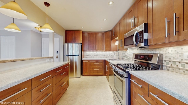4700 Old Orchard Rd Unit 310, Skokie, IL 60076 - kitchen with stainless steel appliances, light countertops, brown cabinetry, and recessed lighting