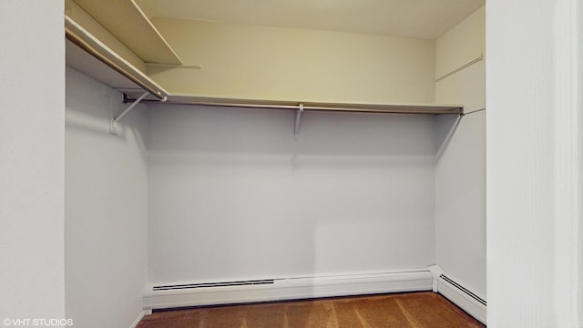 4700 Old Orchard Rd Unit 310, Skokie, IL 60076 - walk in closet featuring a baseboard radiator