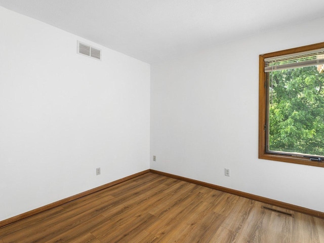 4176 Tumbleweed Trl Unit 0, Loves Park, IL 61111 - unfurnished room featuring wood finished floors and baseboards