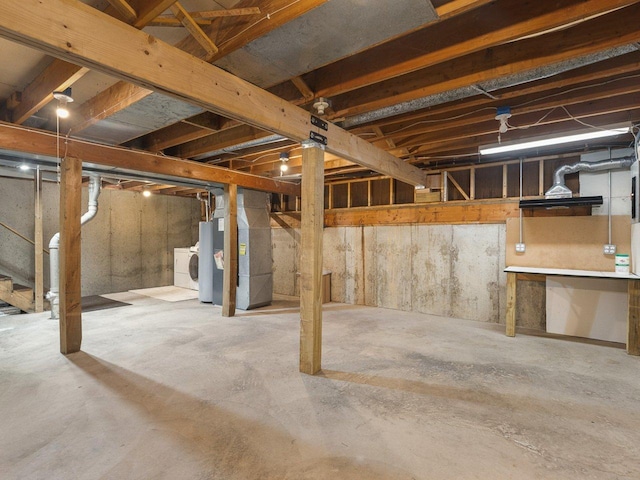 4176 Tumbleweed Trl Unit 0, Loves Park, IL 61111 - unfinished basement with heating unit, washer and dryer, and stairs