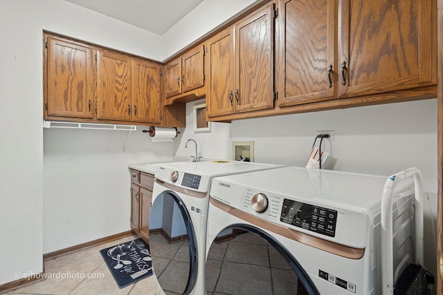 3250 Platte Trl, Olympia Fields, IL 60461 - washroom featuring washing machine and clothes dryer, cabinet space, and light tile patterned floors