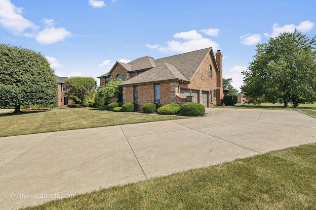 3250 Platte Trl, Olympia Fields, IL 60461 - view of side of property with brick siding, a lawn, a chimney, a garage, and concrete driveway