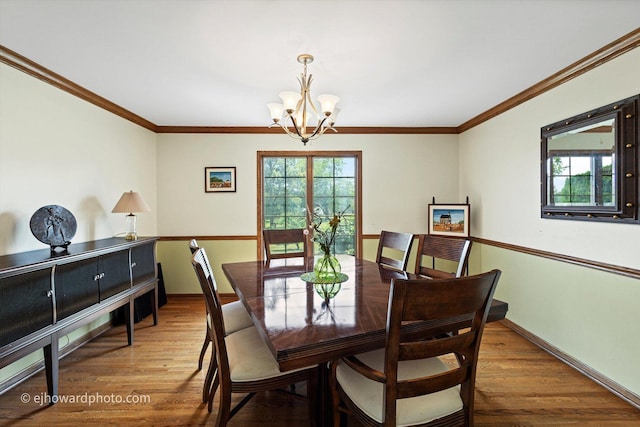3250 Platte Trl, Olympia Fields, IL 60461 - dining room with a chandelier, wood finished floors, and crown molding