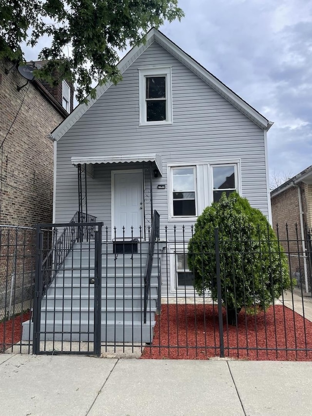 5229 S Campbell Ave, Chicago, IL 60632 - view of front facade with a fenced front yard and a gate