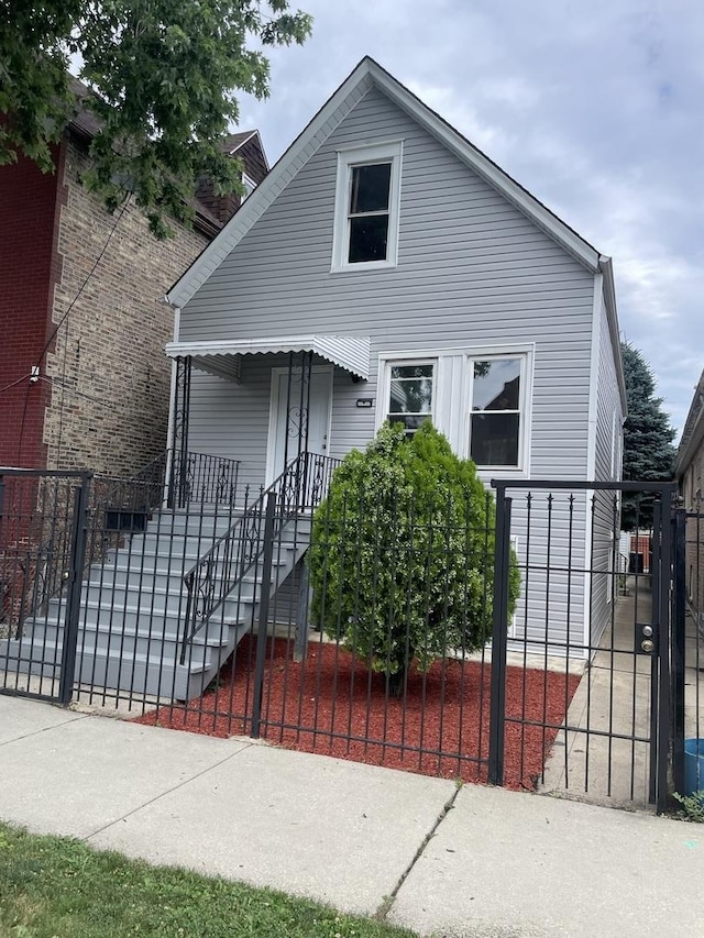 5229 S Campbell Ave, Chicago, IL 60632 - bungalow-style house featuring a fenced front yard and a gate