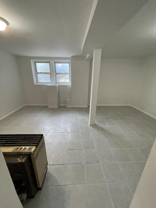 5229 S Campbell Ave, Chicago, IL 60632 - basement featuring light tile patterned flooring and baseboards