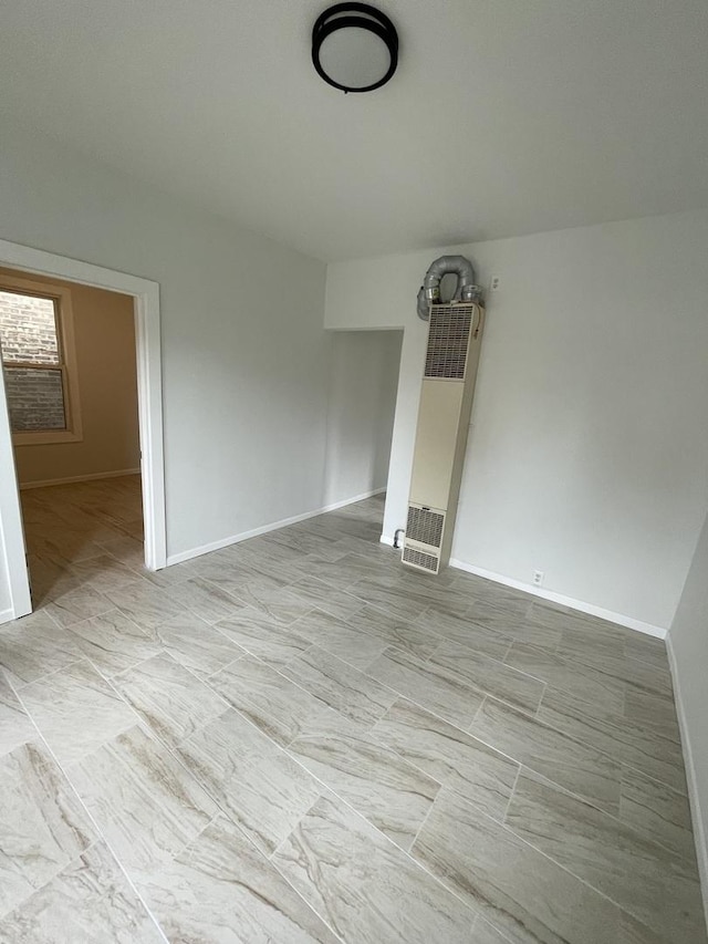 5229 S Campbell Ave, Chicago, IL 60632 - unfurnished living room with a heating unit and baseboards