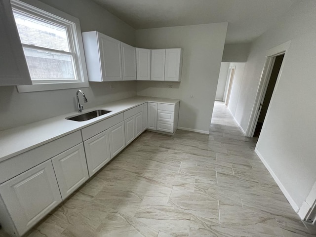 5229 S Campbell Ave, Chicago, IL 60632 - kitchen featuring white cabinets and light countertops