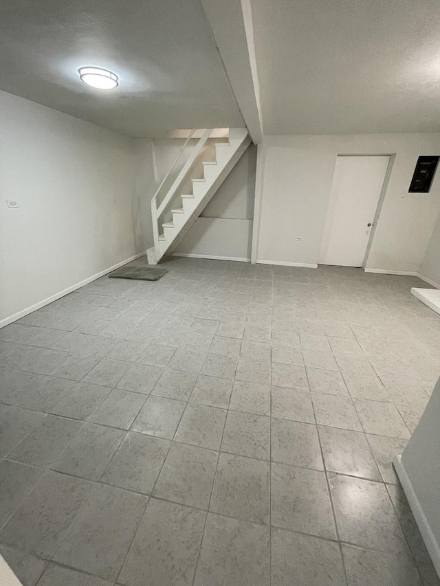 5229 S Campbell Ave, Chicago, IL 60632 - finished below grade area featuring stairway and tile patterned floors