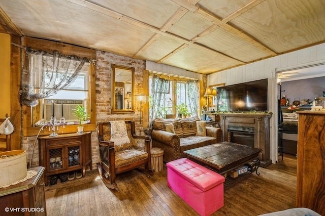 8316 Howe Rd, Wonder Lake, IL 60097 - sitting room featuring hardwood / wood-style floors, wooden walls, and a fireplace