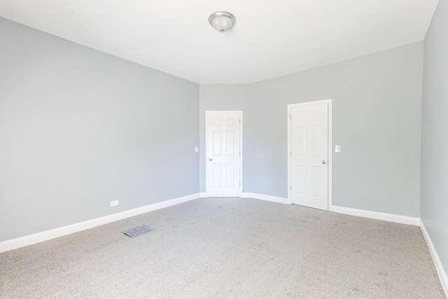 1310 E 72nd St, Chicago, IL 60619 - carpeted empty room featuring baseboards