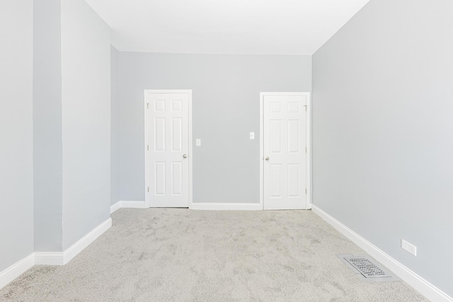 1310 E 72nd St, Chicago, IL 60619 - carpeted empty room featuring baseboards
