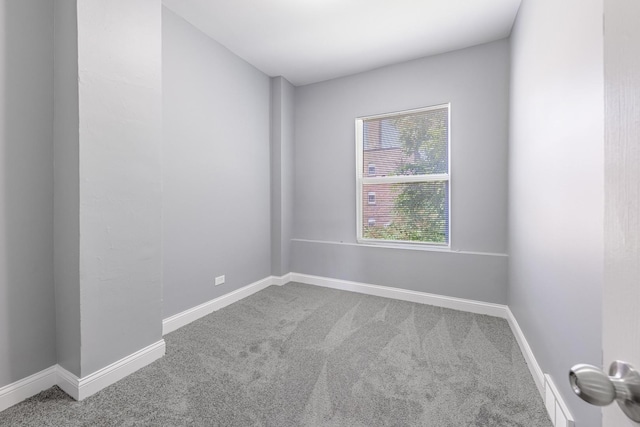 1310 E 72nd St, Chicago, IL 60619 - empty room with carpet