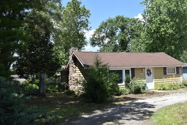 2503 Gaylord Rd, Joliet, IL 60435 - obstructed view of property with a chimney and a shingled roof