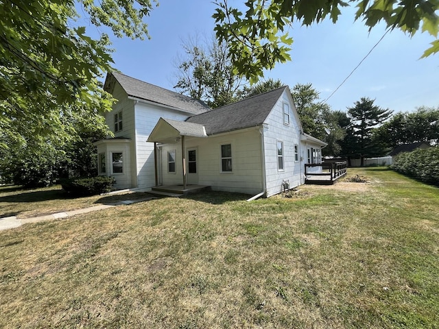 205 N Chicago St, Magnolia, IL 61336 - back of property featuring a yard and a shingled roof