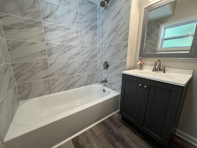 205 N Chicago St, Magnolia, IL 61336 - full bathroom with wood finished floors, shower / bathtub combination, and vanity