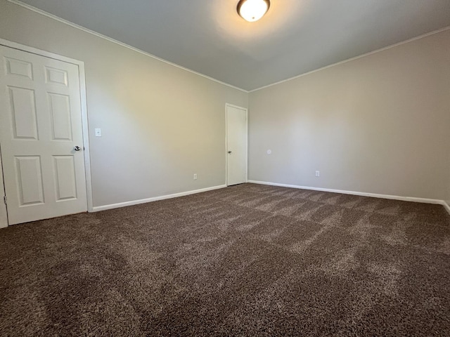 205 N Chicago St, Magnolia, IL 61336 - unfurnished room featuring ornamental molding and dark colored carpet