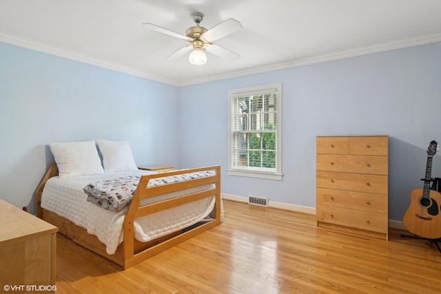 500 E Mayfair Rd, Arlington Heights, IL 60005 - bedroom with ornamental molding, light wood-type flooring, and a ceiling fan