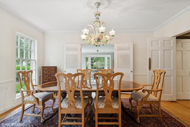 500 E Mayfair Rd, Arlington Heights, IL 60005 - dining room with light wood-style flooring, a chandelier, and ornamental molding