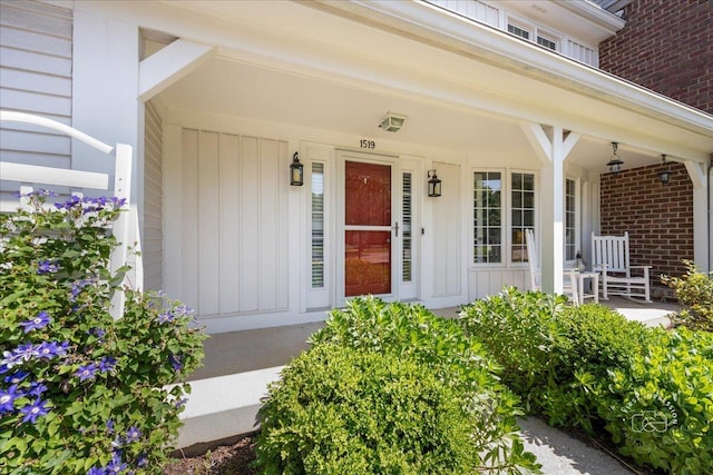 1519 Wedgefield Cir, Naperville, IL 60563 - entrance to property with a porch, board and batten siding, and brick siding