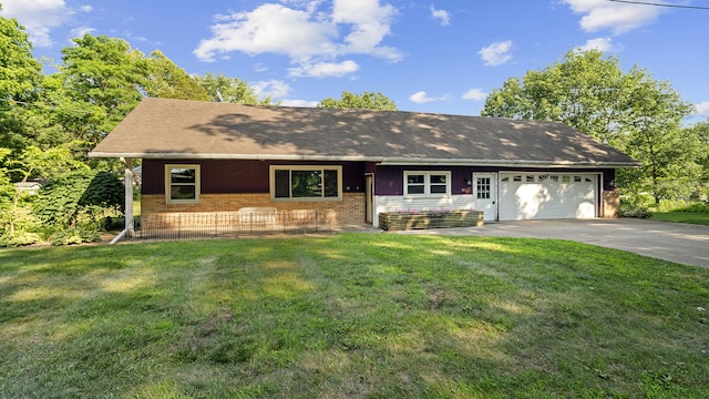 8033 S Pine St, Dixon, IL 61021 - ranch-style house with driveway, an attached garage, brick siding, and a front yard