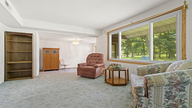 8033 S Pine St, Dixon, IL 61021 - sitting room with carpet flooring, plenty of natural light, and a chandelier