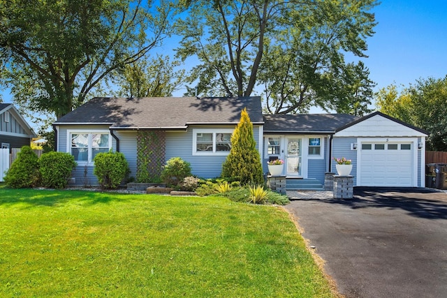 5 Pamela Rd, Lake Zurich, IL 60047 - view of front of property featuring asphalt driveway, a garage, a front yard, and a shingled roof