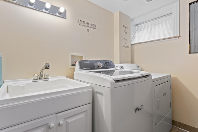 4308 N Ozark Ave, Norridge, IL 60706 - laundry area with washer and clothes dryer and a sink