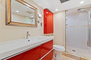 4308 N Ozark Ave, Norridge, IL 60706 - bathroom with a stall shower, vanity, recessed lighting, and tile patterned flooring