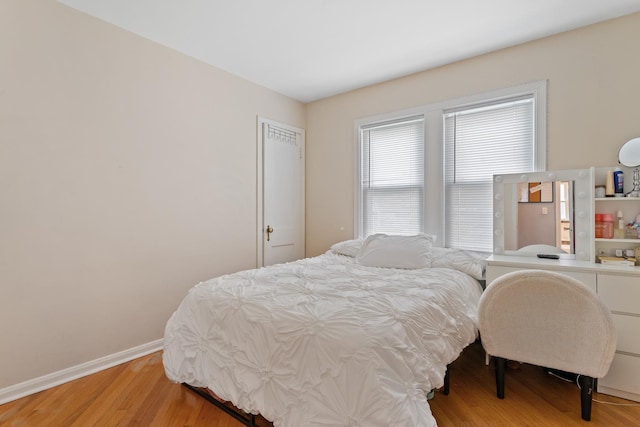 4308 N Ozark Ave, Norridge, IL 60706 - bedroom featuring light wood finished floors and baseboards