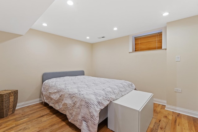 4308 N Ozark Ave, Norridge, IL 60706 - bedroom with light wood-style flooring and recessed lighting