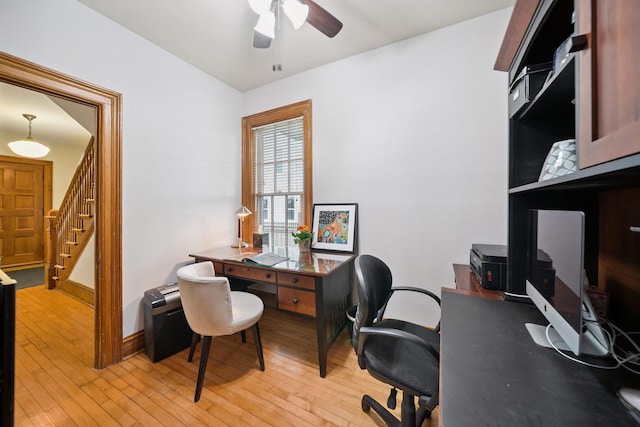 7246 N Oleander Ave, Chicago, IL 60631 - home office featuring ceiling fan and light wood-style flooring