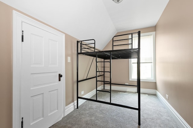 12300 Maple Ave, Blue Island, IL 60406 - unfurnished bedroom with carpet and vaulted ceiling