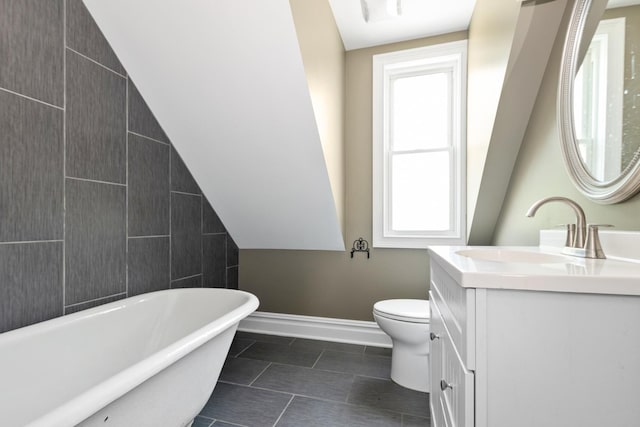 12300 Maple Ave, Blue Island, IL 60406 - full bathroom with a soaking tub, vanity, lofted ceiling, and tile patterned flooring