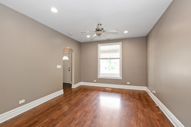 12300 Maple Ave, Blue Island, IL 60406 - empty room with arched walkways, a ceiling fan, wood finished floors, and recessed lighting