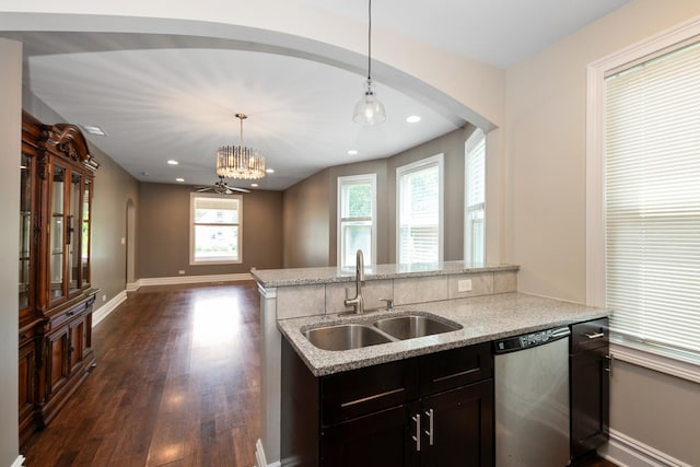 12300 Maple Ave, Blue Island, IL 60406 - kitchen with dishwasher, hanging light fixtures, dark wood-style floors, light stone countertops, and a chandelier