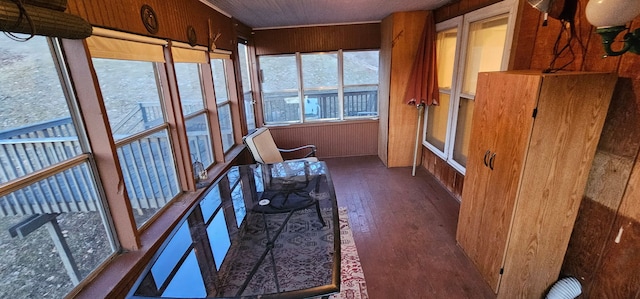 24 Mulberry St, Savanna, IL 61074 - sunroom featuring wood finished floors and wooden walls