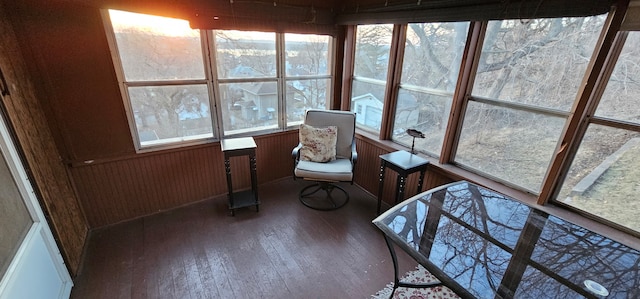 24 Mulberry St, Savanna, IL 61074 - sunroom / solarium featuring wood-type flooring and wood walls